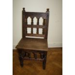 A carved oak Yorkshire style back stool Formally the property of the late Jessye Norman
