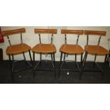 A set of four Arrben of Italy designer chrome and tan hide high stools