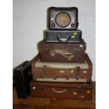 Three vintage suitcases, a Brother De Luxe 1510 typewriter, a case of HMV gramophone records and a b