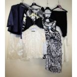 An assortment of blouses and tops together with other items of clothing (9) Formally the property of