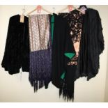 A green and black reversible cape, 100% wool, together with two other capes and two silk shawls. For
