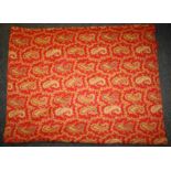 A 20th century crimson ground crepe double bedspread with paisley decoration. 200 x 240cm Formally t