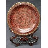 A large presentation Chinese cloisonne circular charger and hardwood stand. 52cm diameter Formally