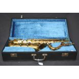 An Amati Kraslice classic super alto saxophone in a blue plush lined travel case