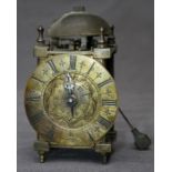 A 17th century style thirty hour miniature lantern timepiece bearing the legend D Quair, London (?).