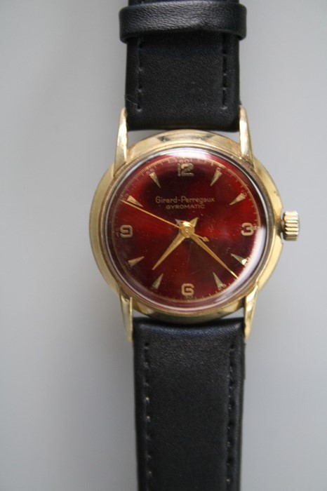 A Girard-Perregaux gyromatic wristwatch, red lustre 2.5cm dial with baton and Arabic numerals, later