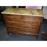 A Louis XV style carved oak commode with figural onyx top. Fitted two short drawers, raised on squat
