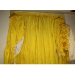 A pair of chrome yellow satin lined curtains and matching pelmeting. 268cm drop x 314cm wide Formall