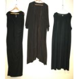 A Ralph Lauren silver and black evening dress with long sleeves together with one other and a black