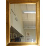 A contemporary gilt framed wall mirror with rectangular bevelled plate 108 x 76cm Formally the prope