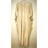 A silk and lace gold Kaftan Formally the property of the late Jessye Norman