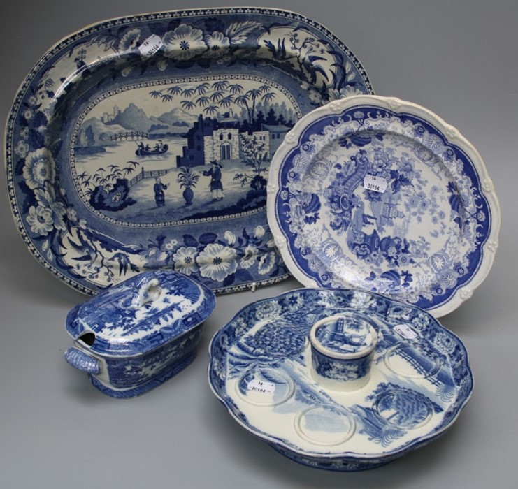 A small collection of blue and white transfer painted pottery wares to include a Man on a Mule patte