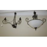 Two contemporary scroll branch ceiling lights, one with frosted bowl shade