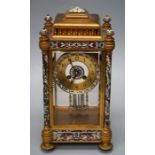 A late 19th century Champleve and gilt brass four glass, eight day mantle clock with faux mercury co