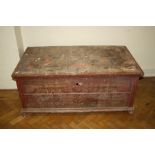 A large painted and decorated Eastern European chest with iron handles, 127cm wide