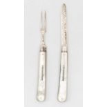 A late Victorian silver folding knife & fork set, mother of pearl handles with inset name