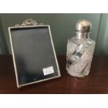 A late Victorian silver topped cylinder cut glass scent bottle, London 1896 and a silver mounted