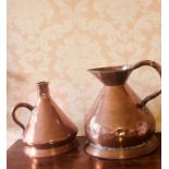 An early 20th century copper 4 gallon jug; a similar 2 gallon copper jug. (2)