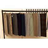 A collection of Tweed, Wool and Plain Pencil Skirts by Daks. Sizes: 10/12. (10)