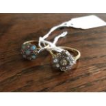 An 18ct gold and platinum set old cut diamond cluster ring, and an opal and diamond cluster ring (2)