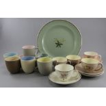 A group of early twentieth century art deco period Poole Pottery and Branksome Pottery muted tone