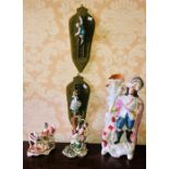 Assorted continental porcelain figures of courting couples; similar pair of wall plaques; another