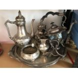 A silver-plated four piece Tea service cast flowers, two plated trays, two stands, spirit kettle