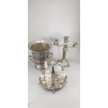 A seven piece Cruet on silver plated stand with top handle and supports, together with a plated