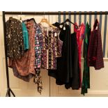 Ten dresses and skirts to include: A wool Chanel style jacket & skirt 1960s which is edged in red