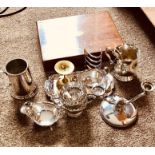 A set of silver plated tableware, including gravy boat, toast rack, tankard, etc; set of plated