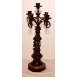 A neoclassical revival French bronze figural candelabra, five branch candles on a vase column held