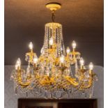 A gilt metal fifteen light pendant electrolier with cut glass droppers, drop approximately 95cm