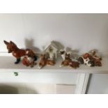 Six Goebel Models of dogs, a fox, and a crested porcelain dog in a kennel (6)