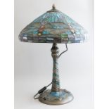 An Art Nouveau style double light table lamp decorated with dragonfly, height 58cm, with matching