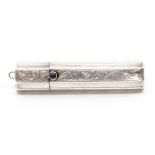 An early 20th Century silver lipstick tube, bright cut engraved, sapphire cabochon button
