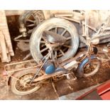 A 1967 Raleigh moped, 49cc petrol, blue/black, Reg No.PUY 707E, with registration book and various