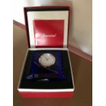 A boxed recent blue glass Baccarat timepiece