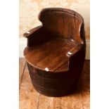 An early 20th Century oak cooper barrel in form of a child's chair. 56cm H x 46cm W