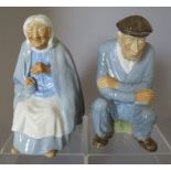 A pair of Irish Porcelain, Wade Portadown Figures modelled by Raymond Piper. They depict Dan