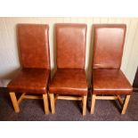 A set of six recent leather dining chairs. (6)