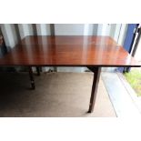 A 19th Century mahogany drop leaf dining table, square sectioned ends, raised on square legs, 71cm