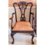 A 19th Century Chippendale style open armchair,