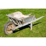 A vintage wooden wheelbarrow with rubber tyre, length 170cm