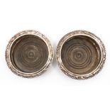 A pair of old Sheffield plated bottle coasters, circa 1820, with wooden inserts, diameter 12cm (2)