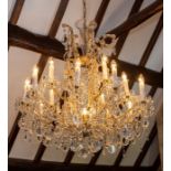 A fifteen light two tier pendant electrolier, clear facet cut beads and droppers, drop approximately