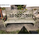 A wooden garden bench of Chinese Chippendale design, from Dunston Hall, Chesterfield