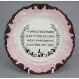 An early twentieth century Carltonware advertising plaque with plink lustre rim for Guinness, c.