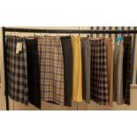 Tweed and Check skirts & Herry Bone check in wool etc. Pencil skirts, kick pleat designs by Oak