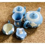 A set of Wedgewood Jasper teapot, sugar pot, milk jug, etc.