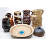 A collection of assorted studio pottery including PM Cox vase, terracotta vase, GE studio bowl,